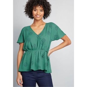 Cute Monstera peplum swing blouse, size small.
